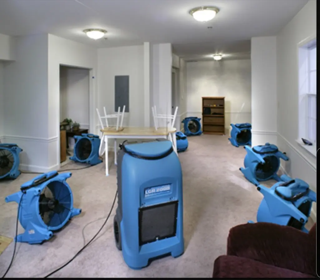 Air movers and dehumidifier setup for Water Damage Restoration in Harvey